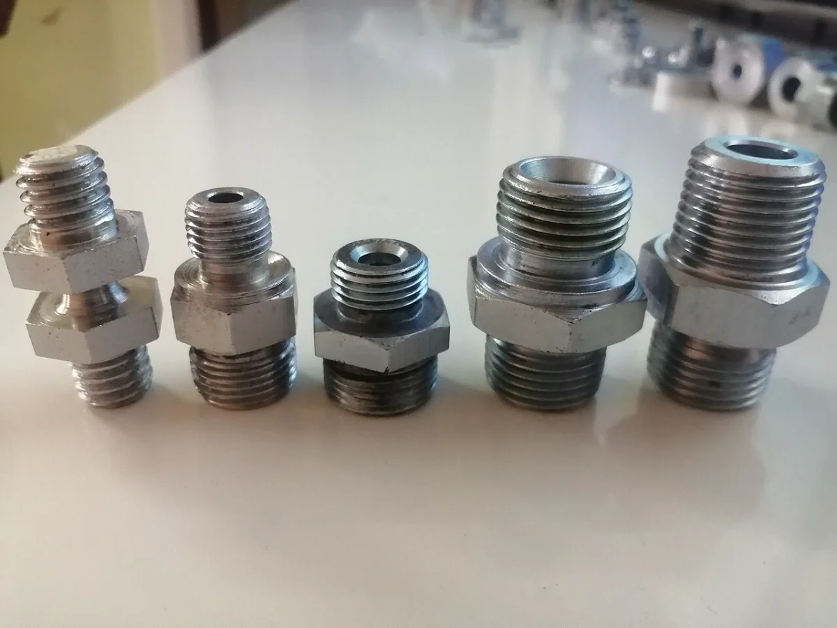 Các kép ren lục giác nhiều cỡ với ren ngoài hai đầu, minh họa kép ren inox